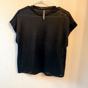 Never worn Anthropologie sheer, black short sleeve top.